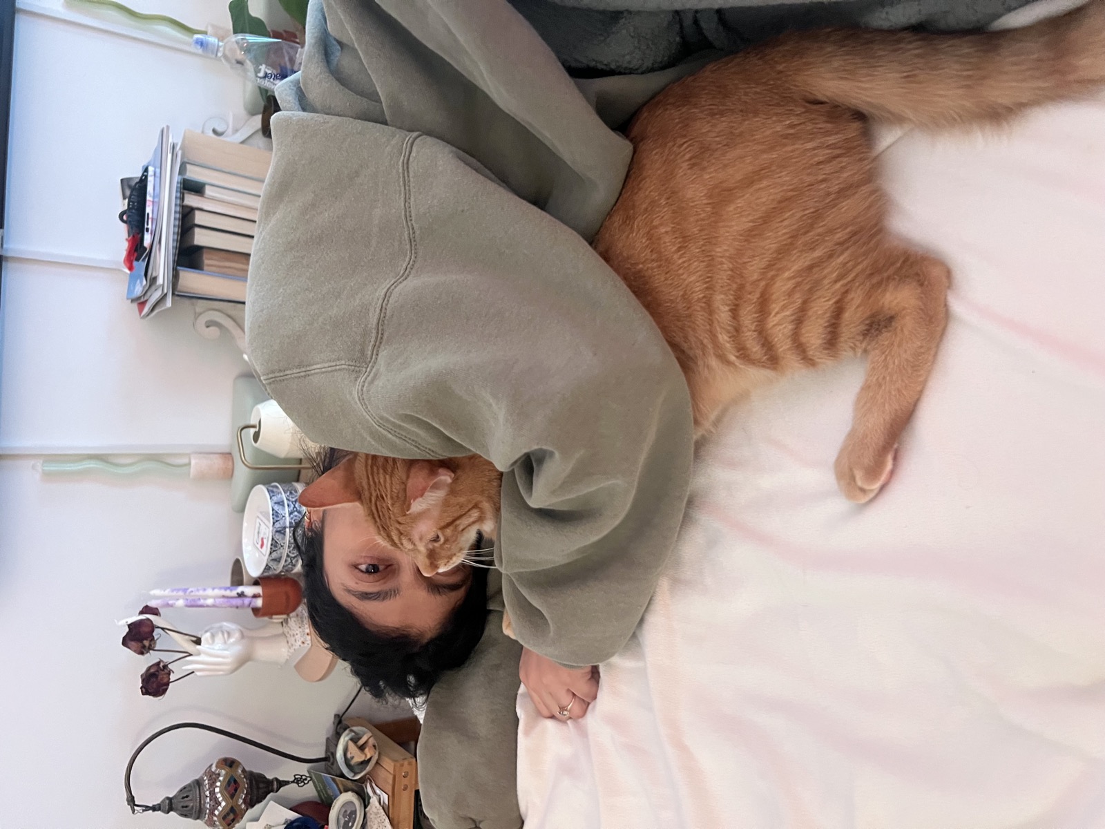 Sebastian snuggling on bed