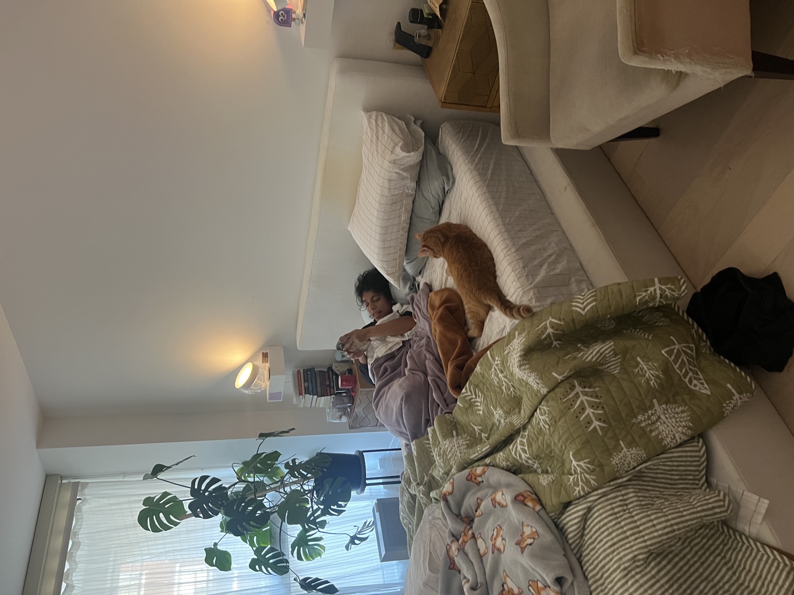 Sebastian watching from bed