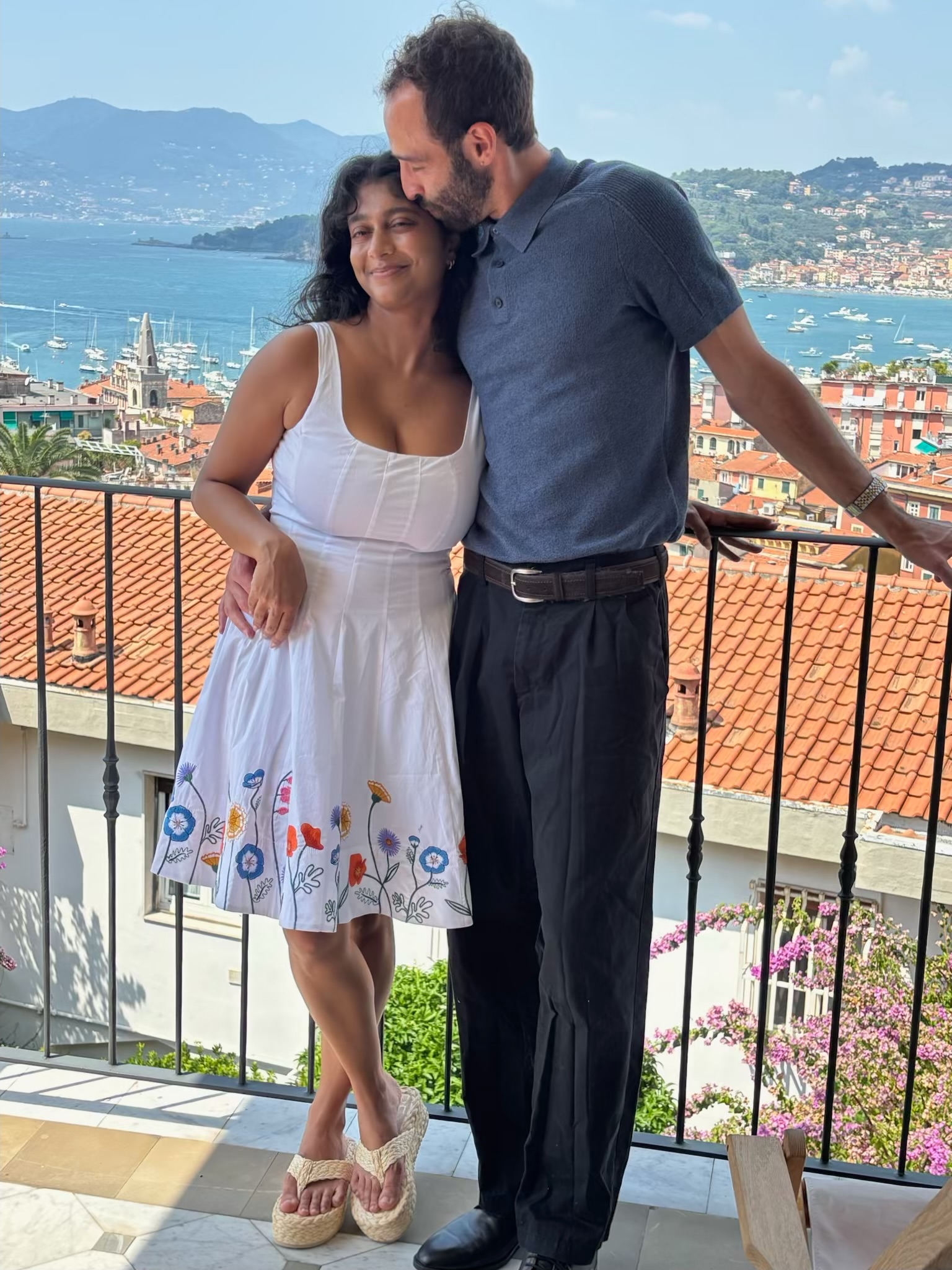 Us in front of the building